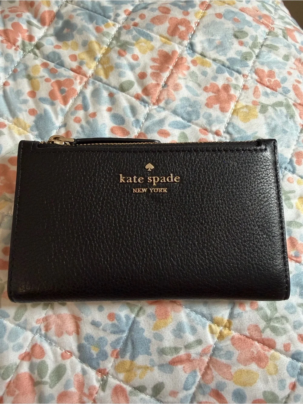 kate spade black leather zip card wallet with gold logo